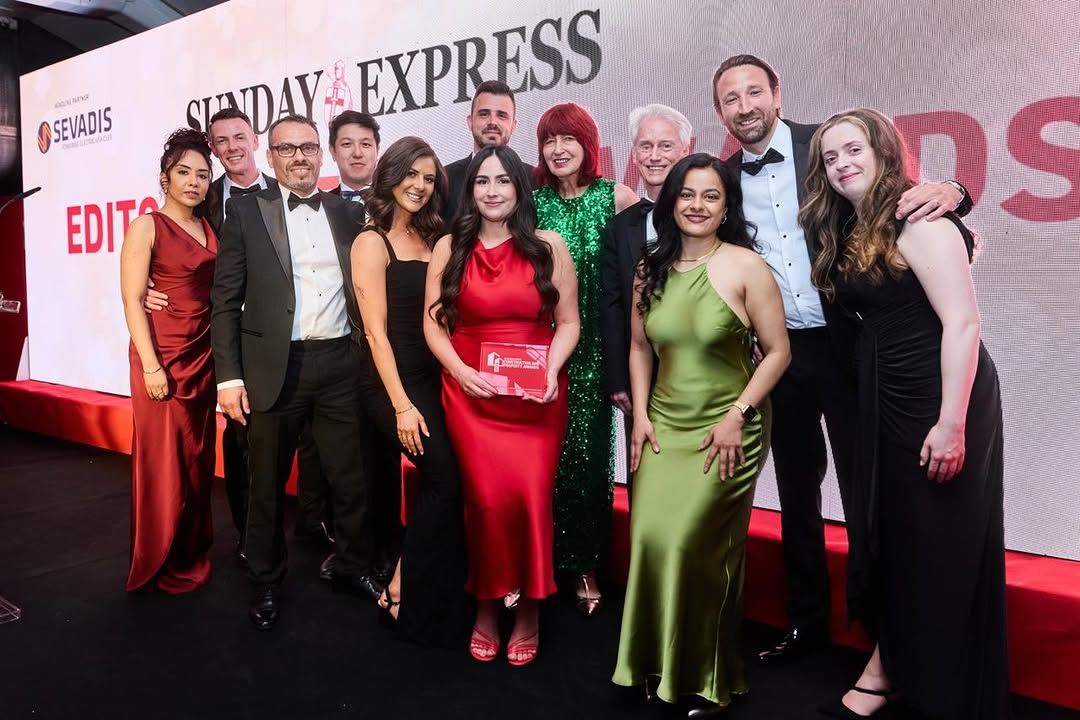 The NPP team collecting their award at the Sunday Express Construction and Property Awards